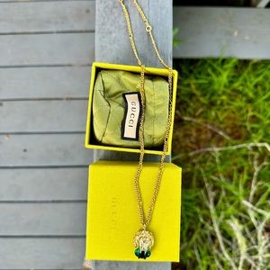 Like new, worn once Gucci lion head necklace